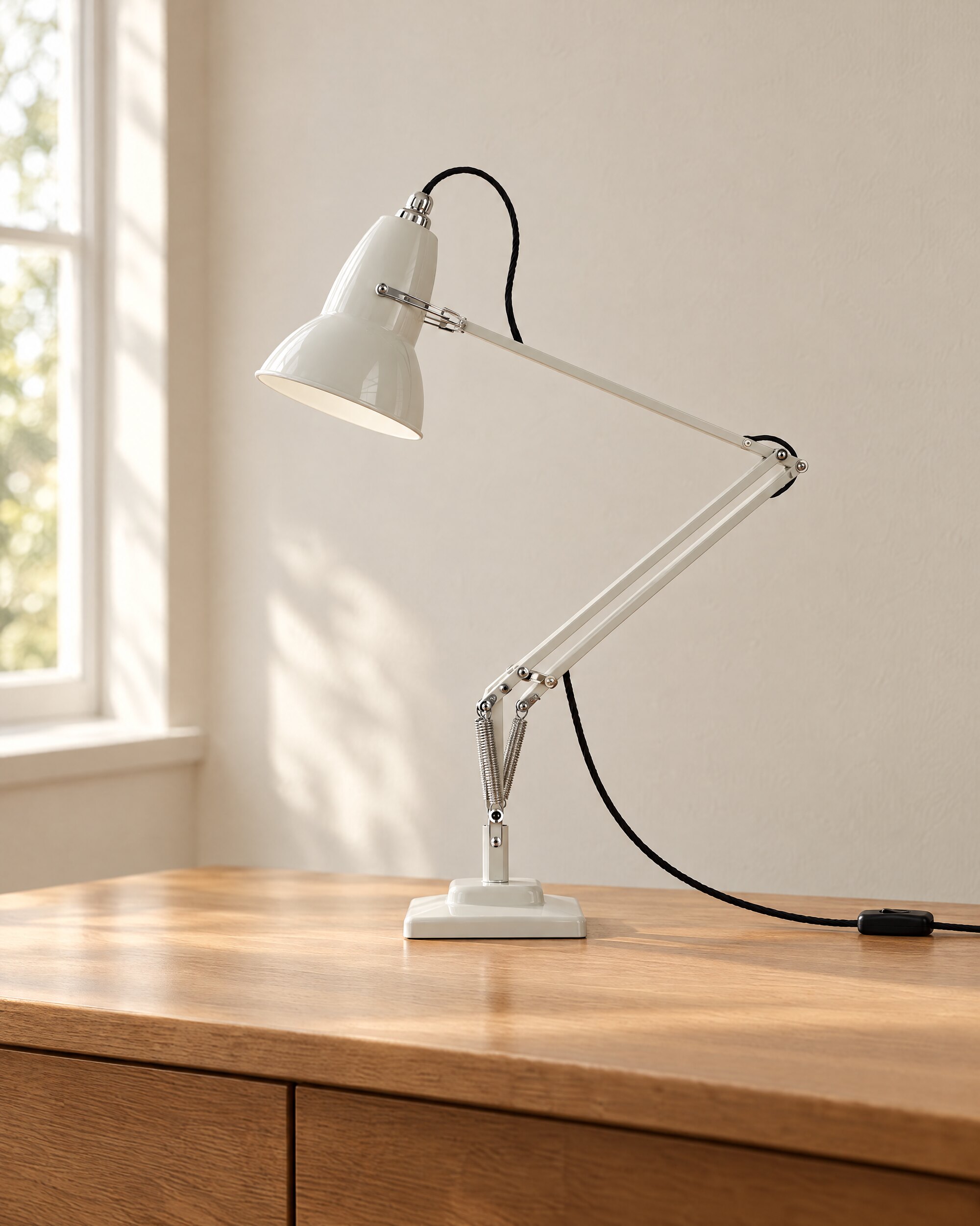 Anglepoise Original 1227 desk lamp in Linen White on an oak desk in soft natural light