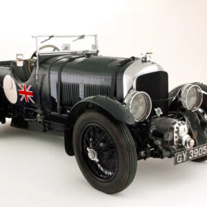Supercharger and leather bonnet strap on a vintage green Bentley 4.5 Litre