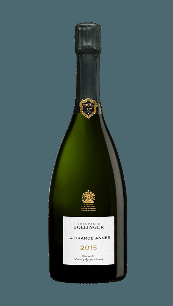 Bollinger La Grande Année 1990 style champagne bottle in a silver ice bucket in a hotel room