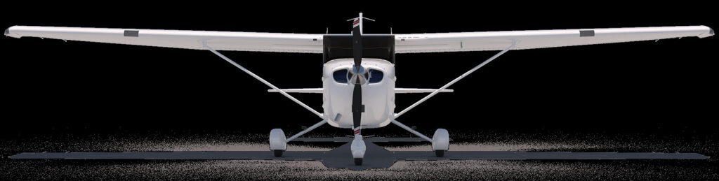 White high-wing light aircraft parked on a grass airstrip at dawn