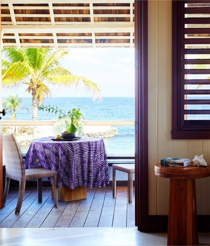 Beach villa veranda opening onto a private beach in Jamaica