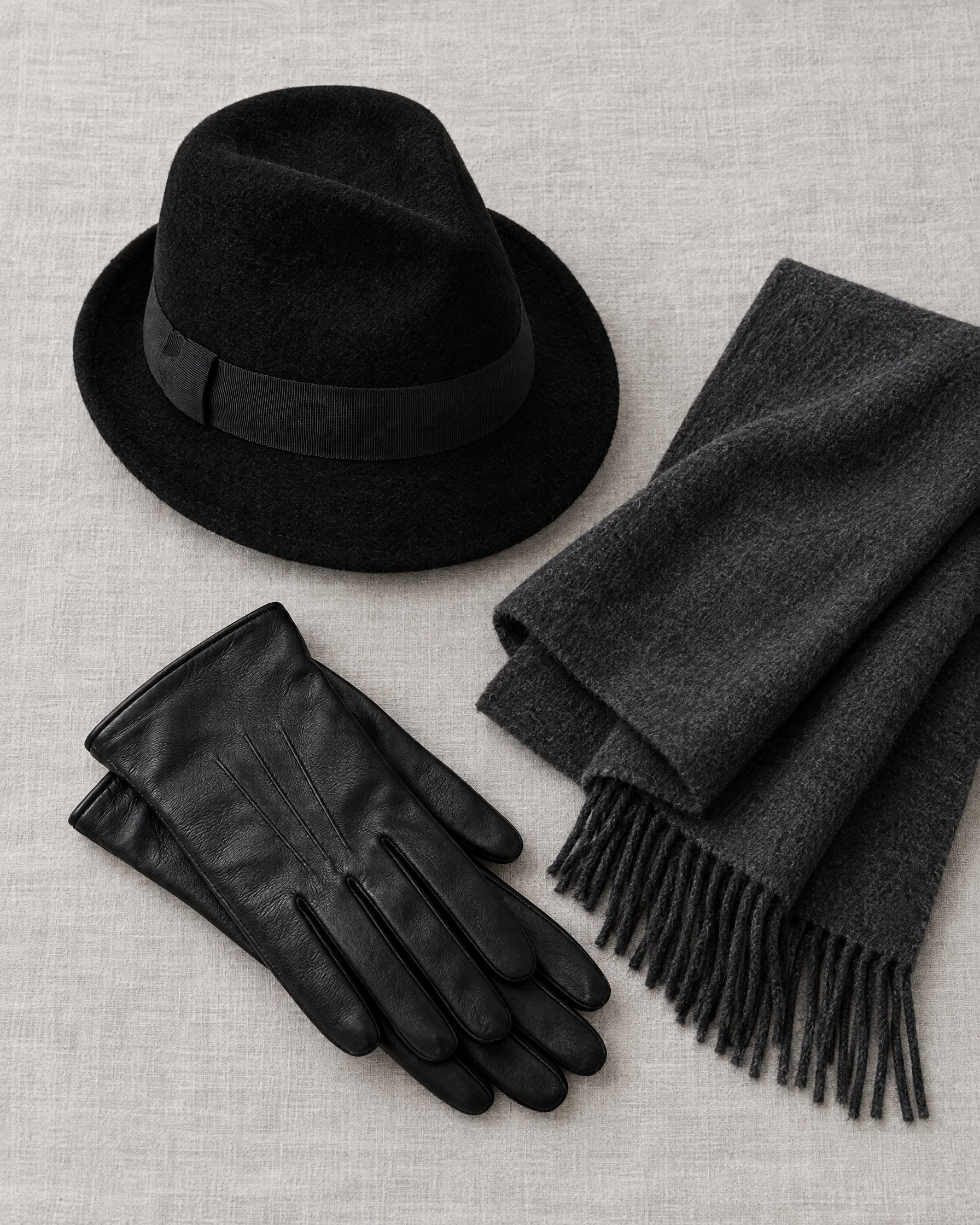Black velour felt Vesper trilby with a charcoal scarf and leather gloves