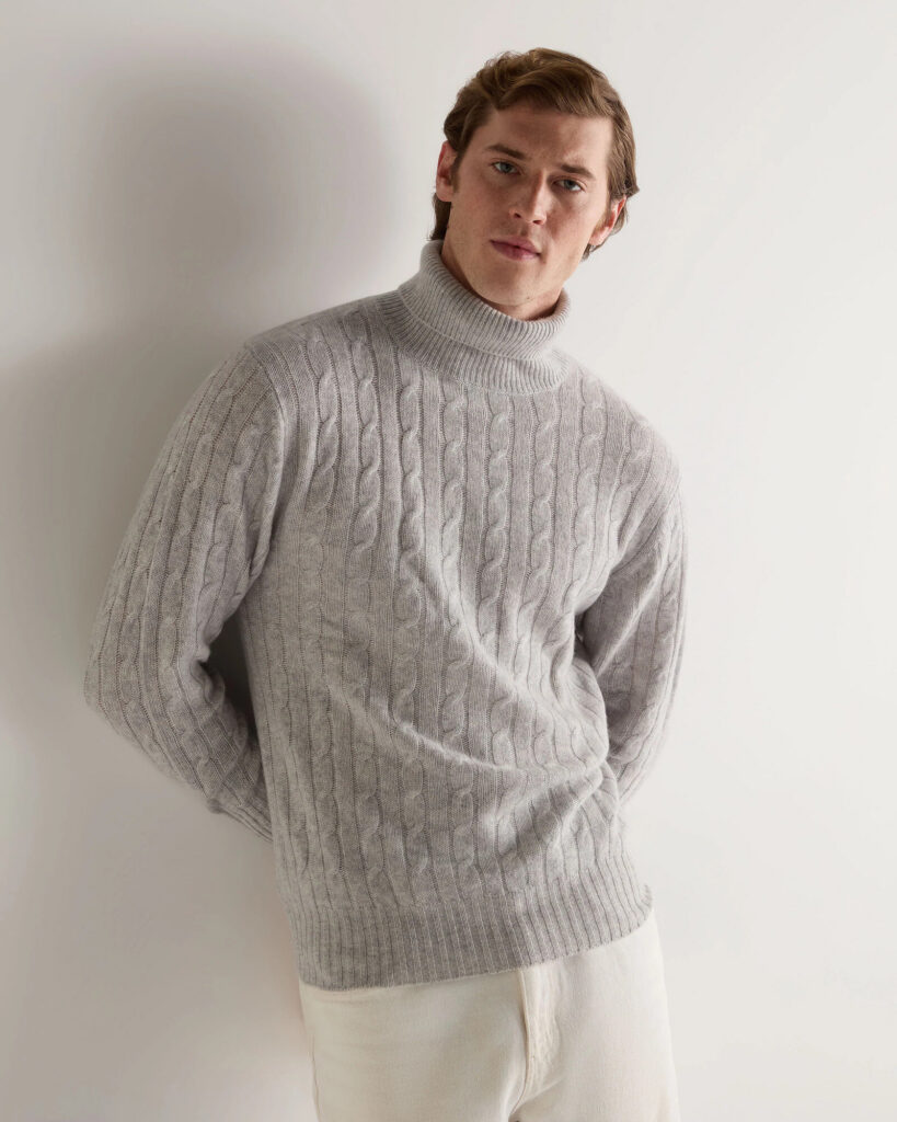 N.Peal 007 Chunky Ribbed Polo Neck Sweater in dark charcoal, folded flat