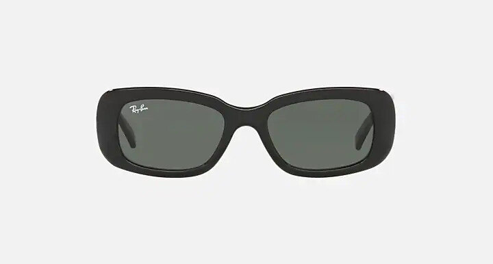 Ray-Ban RB4122 sunglasses in glossy black with green-grey lenses on grey linen