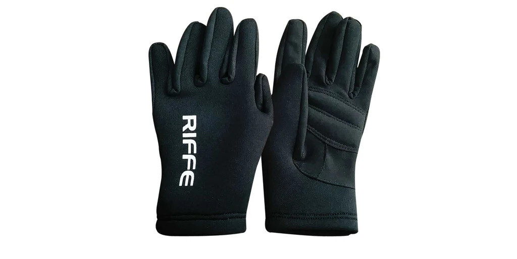 Pair of black Riffe Amara gloves in neoprene on weathered teak boards with natural rope