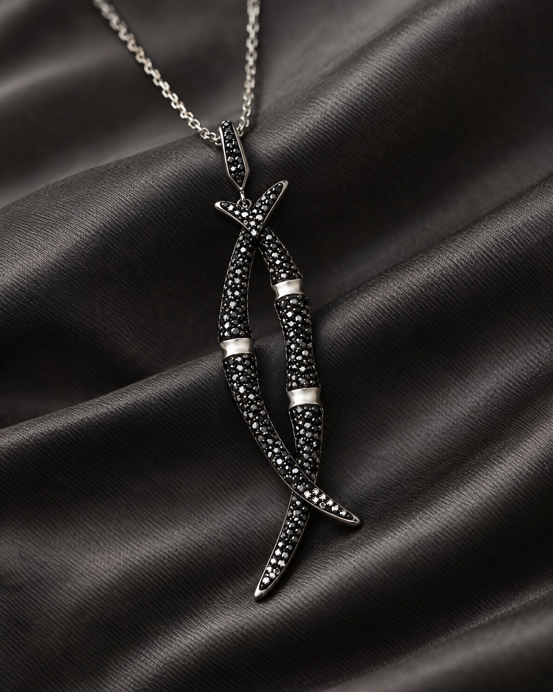Swarovski Black Bamboo pendant with black crystals on dark silk