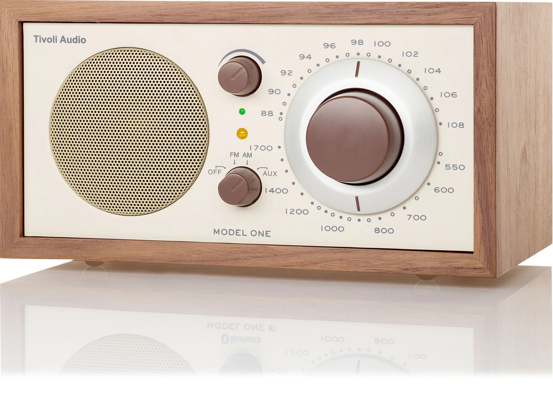 Tivoli Audio Model One Bluetooth radio in walnut on an oak sideboard in a sunlit room