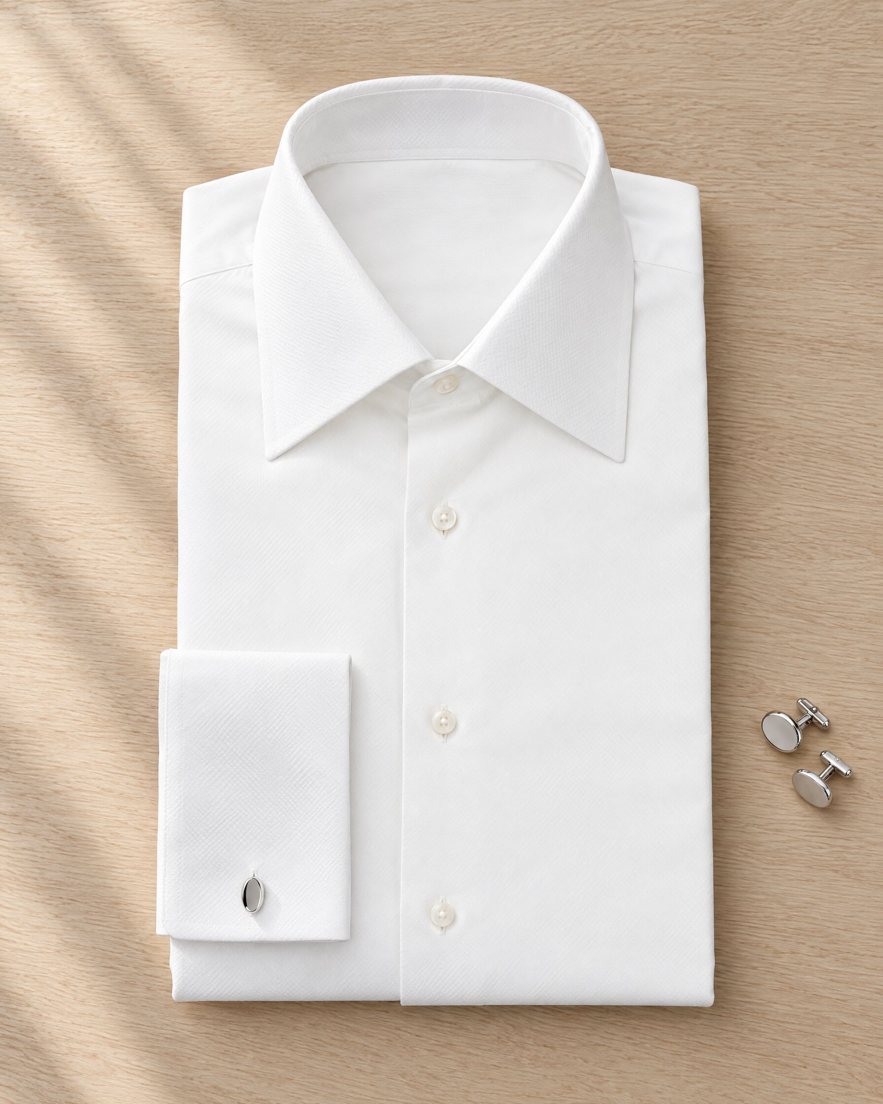 Tom Ford white French cuff shirt style: a crisp white cotton shirt with plain cufflinks