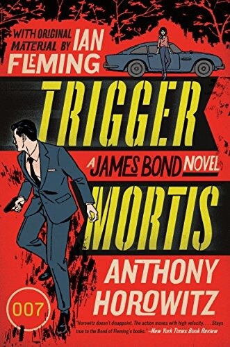 Blue paperback Trigger Mortis Harper paperback on a leather desk blotter