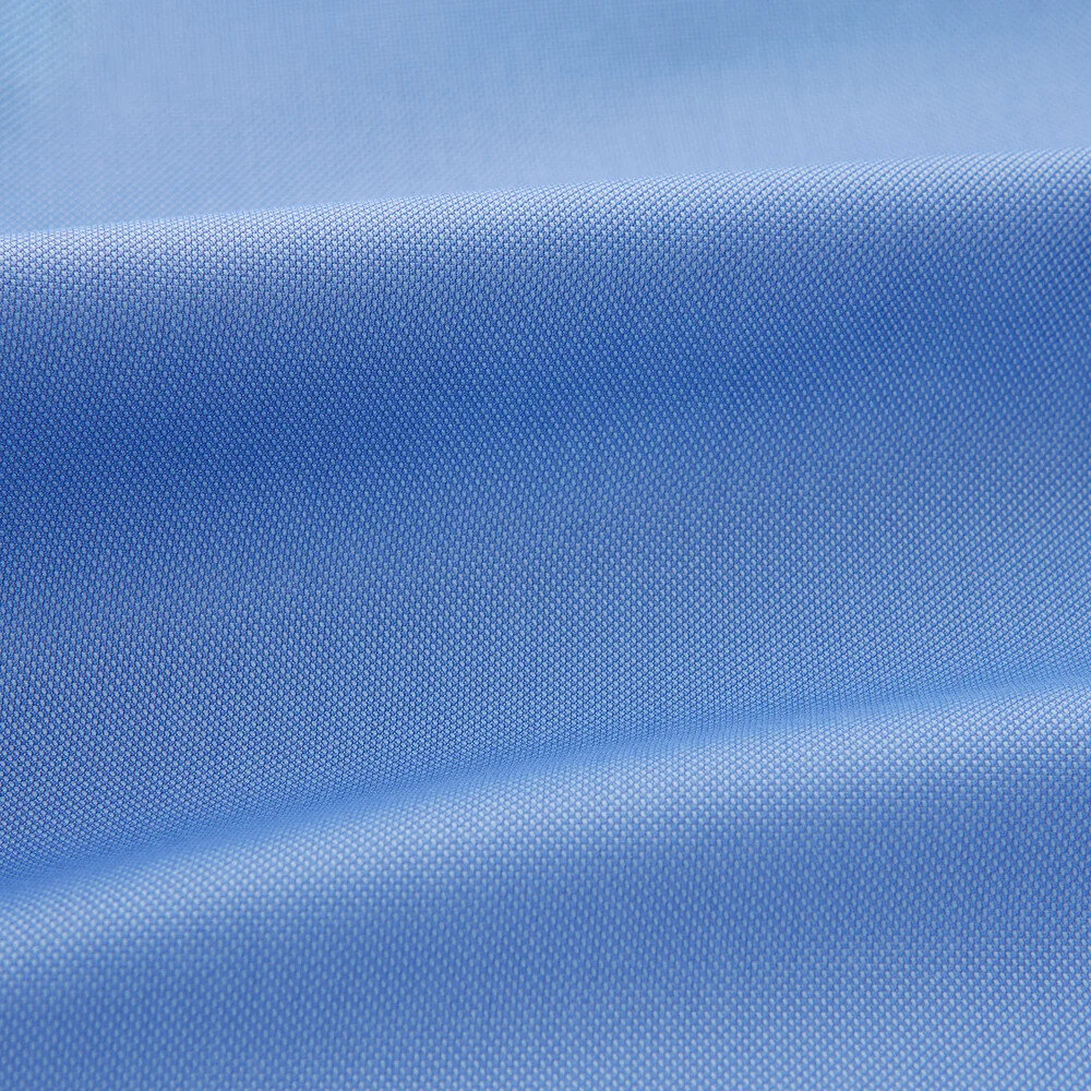 Turnbull & Asser Istanbul shirt style blue oxford shirt flat lay with knitted tie and belt