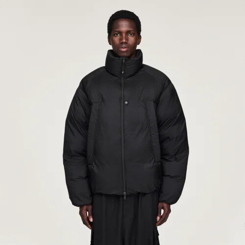 Blue lightweight zip jacket in the spirit of the Y-3 jacket from Quantum of Solace, laid flat with trousers and shoes